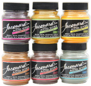 Set of six bottles of Jacquard Acid Dyes with labels on a white background